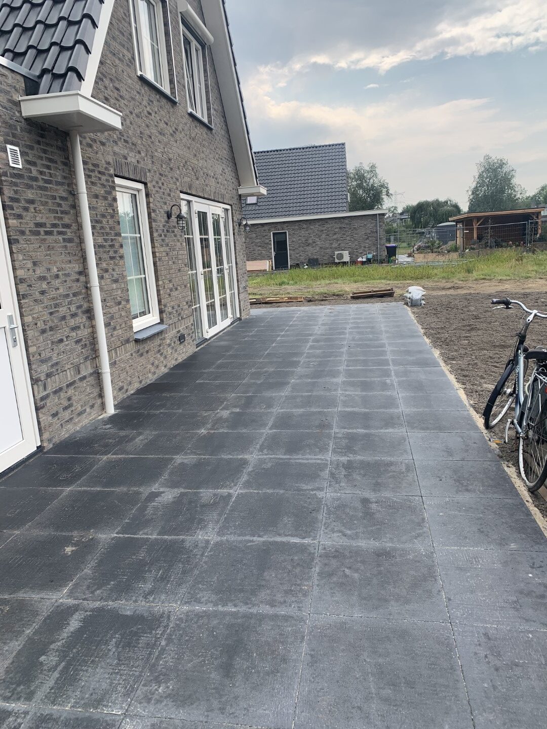 Aanbrengen terrastegels 60x60