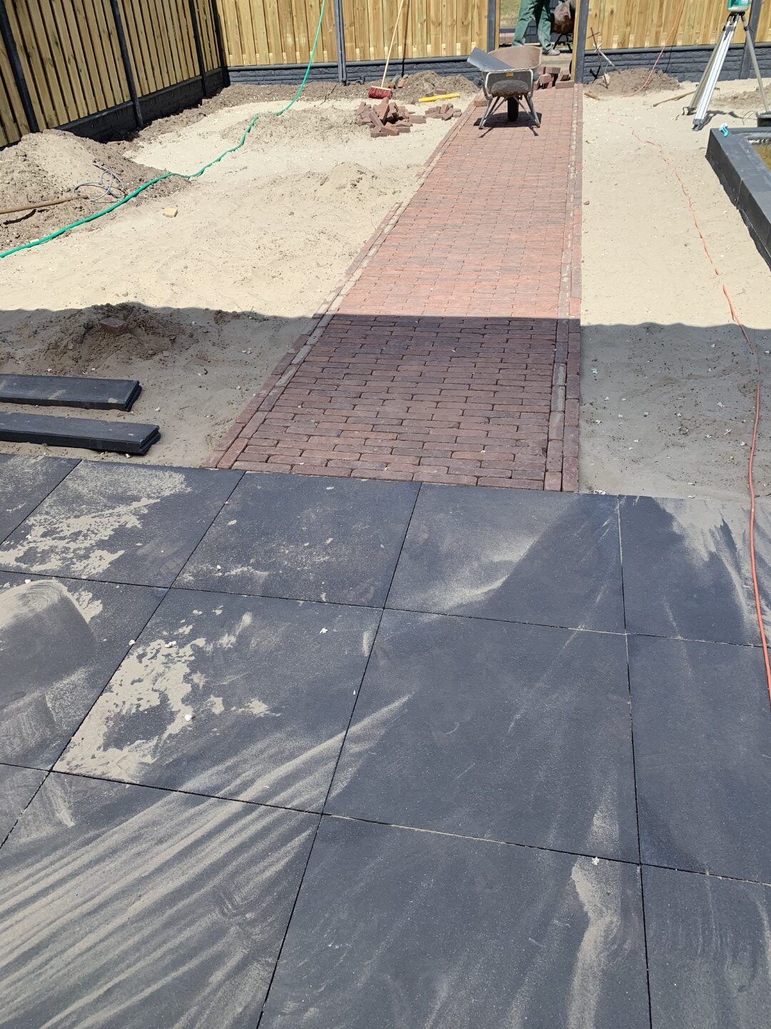 Combinatie terrastegels 60x60 en gebakken waalformaten